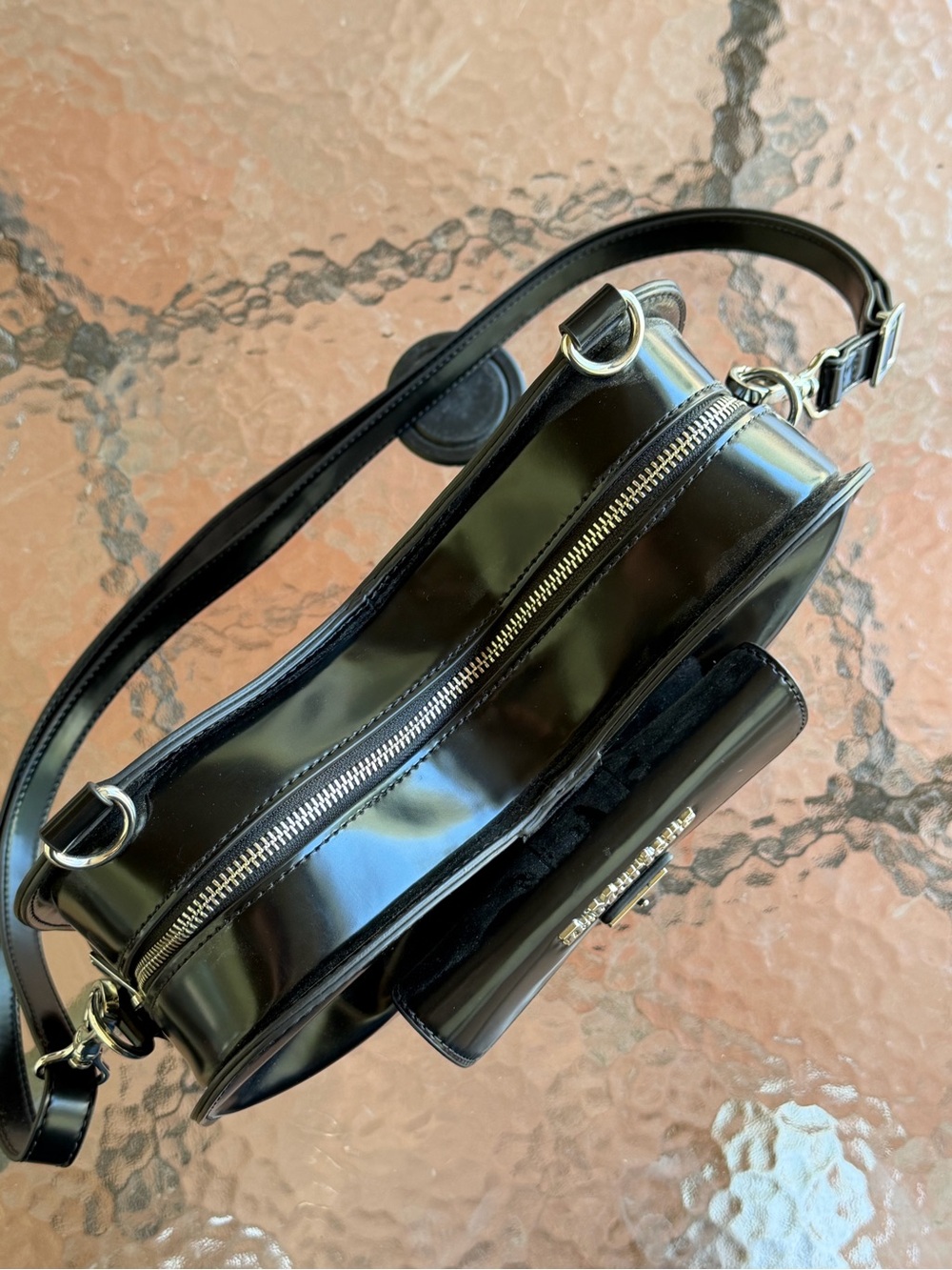 Dr. Martens Black Patent Bow-Shape Shoulder Bag with Gold Hardware - Picture 2 of 6